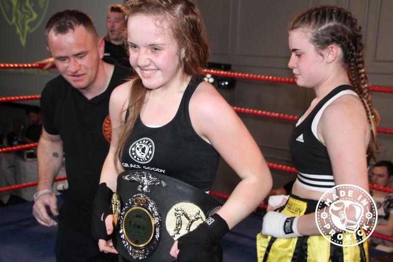 New Champ Amazing Grace Goody with good sport Jade Molloy placing the belt on Grace.