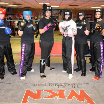 Ladies and a man mix it up in sparring