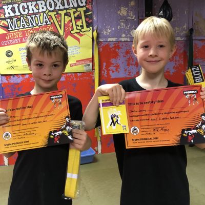 Pictured - James & Charlie Lecky move to the first ProKick belt - yellow belt. Well done.