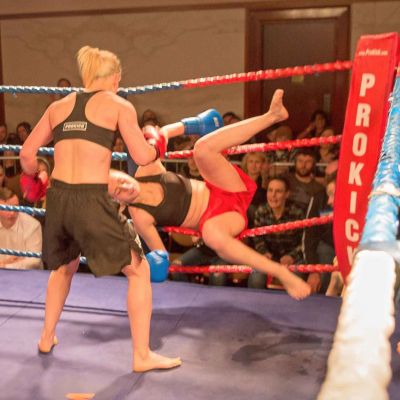 Cathy McAleer Punches Polish champion Ciaskowska through the ropes at the Stormont Hotel