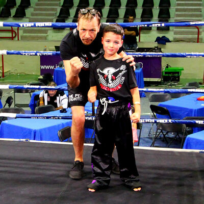 Reuben Graham (age 8) with coach Murray