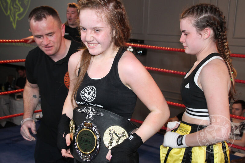 New Champ Amazing Grace Goody with good sport Jade Molloy placing the belt on Grace.