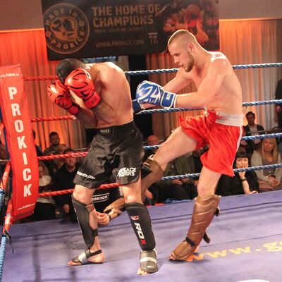 Patryn Klak lands a hard low-kick to ProKick’s adopted Iranian Salman Shariati at the Stormont Hotel in Belfast