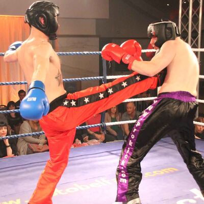 Take that a good front kick to the body of David Rose during their contest at the Stormont Hotel