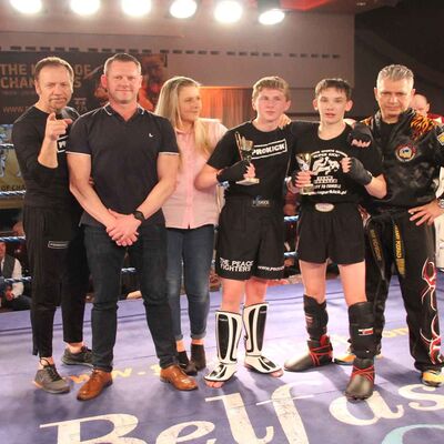 Happy families Jay with his Mum & Dad after he took the nod from the judges at the Stormont Hotel agains't Nowak of Poland.