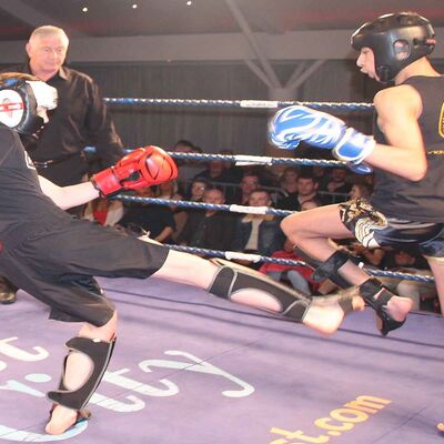 James Braniff fires in a Low-Kick to Krill at the start of their match