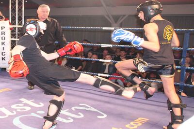 James Braniff fires in a Low-Kick to Krill at the start of their match