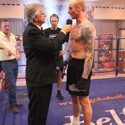 Darren talking with MC Mr Gary Gillespie at the end of his match 