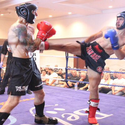 Reza takes a round kick from James at the Stormont hotel in Belfast on June 30th 