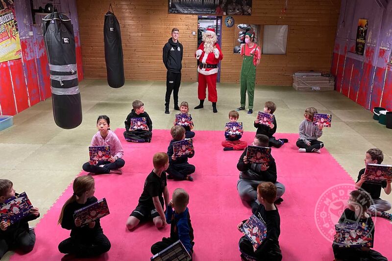 Kids at the 10am Class Saturday 18th Dec at the ProKick Gym in Belfast - This time Santa brought one of his trusted helpers with him, ‘Elf’.