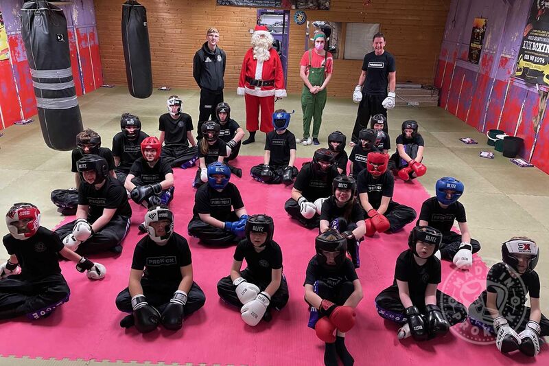 Kids at the 12pm Class Saturday 18th Dec at the ProKick Gym in Belfast - This time Santa brought one of his trusted helpers with him, ‘Elf’.