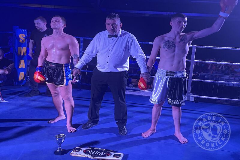 Jay Snoddon is the New WKN 64kg champion - It only took into the second round of a scheduled five before Snoddon's game-plan came into affect as he chopped the legs of Scotland's Shane Weir.