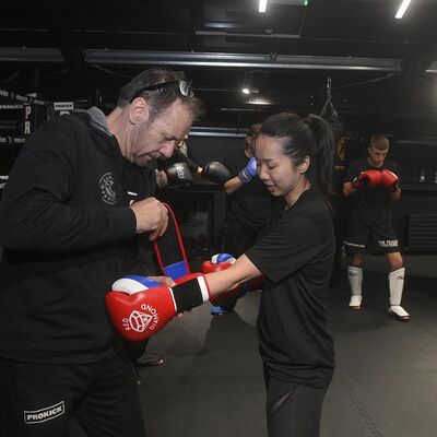 Gloving-up ready to start - Warm-ups done Yuko Koshikawa, starts to train at the iconic new ProKick gym. -Japan Belfast Connection