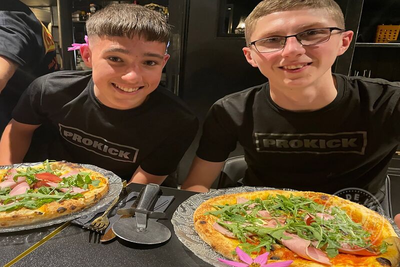 Pizza?! So the weigh-in was done the two fighters shared quality time, relaxing, chilling meeting and talking with new contacts, having a laugh and yes broke bread together before battle. PIZZA!