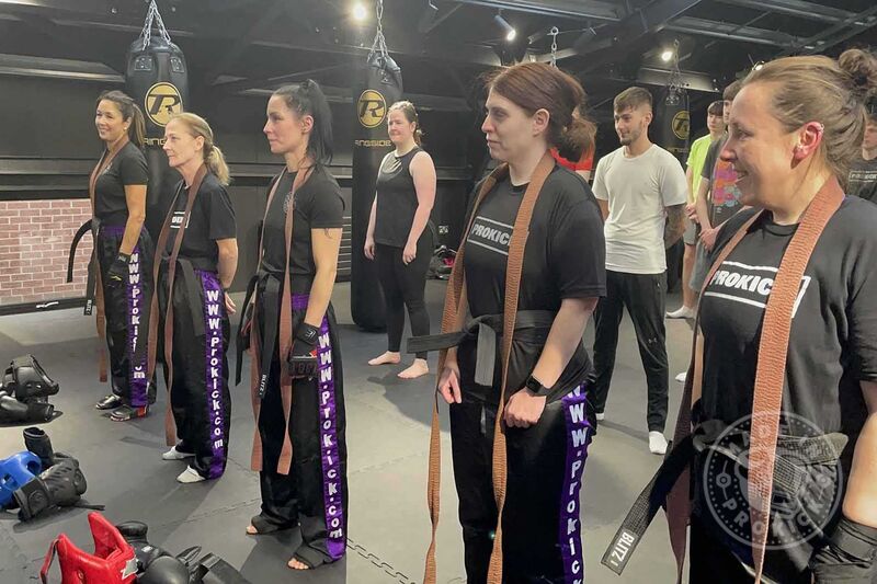 Their brown belts were undone and their new black belts were tied around their waist by Mr Murray with smiles, tears and loud sighs of relief all round.