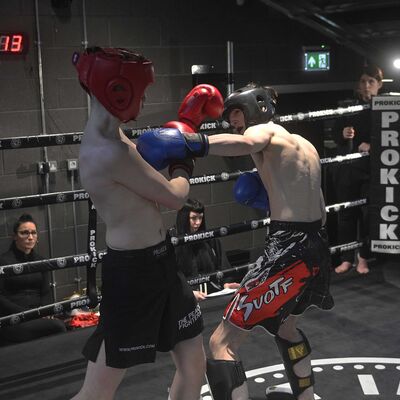 Eddie Islas (Golden Dragon, the Loop) lands on  Adam Davidson ( ProKick) in their WKN Low-Kick Rules 3x2 Min Rounds 60-62.kg