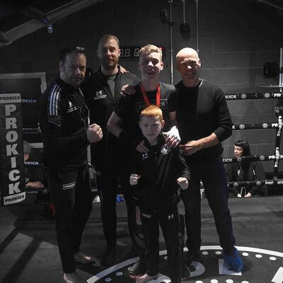 Keep in in the family - Family affair, Grandfather, John, the Dad Johnathan, the Uncle, Coach Billy Murray with assistant corner helper, grandson Leo Smith and the fighter of the match winner, Max Murray. Smiles all round