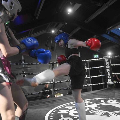 Ollie Hamilton 16yrs (ProKick) fires a low-kick with Kady Shaw 16yrs (TopPro Carlow) from at the ProKick Gym in Belfast at Champions Fight League No.3