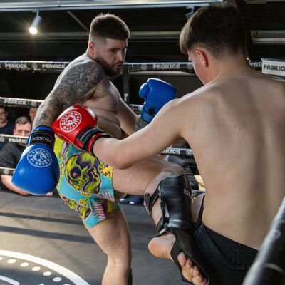 Kicking action as Tieran lands a low-kick in a Light-contact match with Gary Lynch (ProKick) Vs Tiernan McNally (Golden Dragon - The Loop)