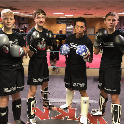 Hiro with 'Triple J' James, Joshua & Jay after a sparring session