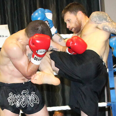 Johnny Swift Smith fires in a knee kick against Cypriot Periklis Filippou