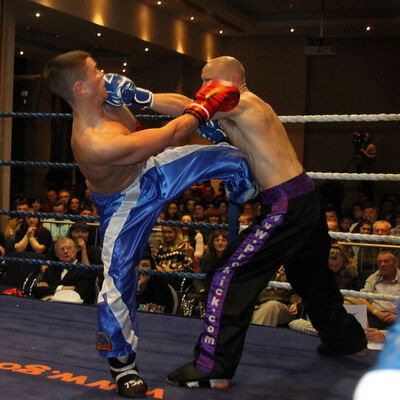 one each Matthew Kerr (Belfast, NI) counters Shane Weir's round kick