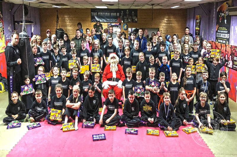 This was the 27th year the BIG MAN himself ‘Santa Claus.’ called to say hello to the Kicking MAD kids at the esteemed kickboxing gym in Belfast. It all happened DEC 22nd 2018.