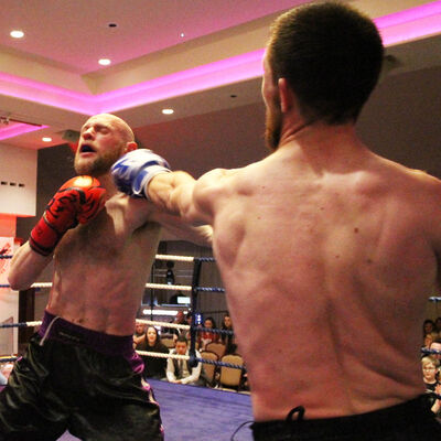 Kerr Takes It On Chin from Thomas Poullain (Switzerland) at the ProKick event at the Stormont hotel on 23rd FEB 2019