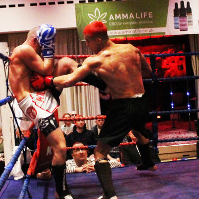 Killian Killian lands a body punch to Shane Weir during their kickboxing match at the Stormont hotel Saturday 23rd FEB 2019