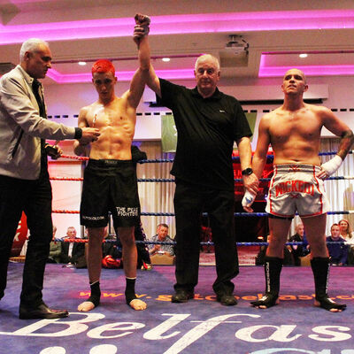 Killian Emery pictured gets the official nod from the WKN president and Shane Weir and referee Mr Bob Hunter after their kickboxing match at the Stormont hotel Saturday 23rd FEB 2019