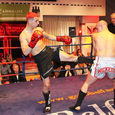 Round Kick as Killian lands a hard kick to the body of Shane Weir in Belfast's ProKick event at the Stormont hotel