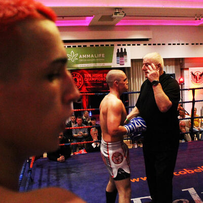 Emery looks on calm and collected as Ref Mr Bob Hunter stops the fight with Shane Weir