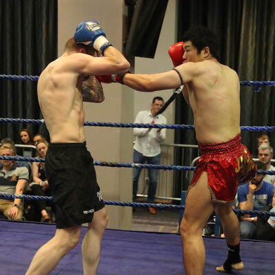 Another punch as Jihoon lands left Jab to Smith - action from the WKN title match with Jihoon Lee Vs Johnny 'Swift' Smith at the Clayton hotel Belfast on 23rd, June 2019