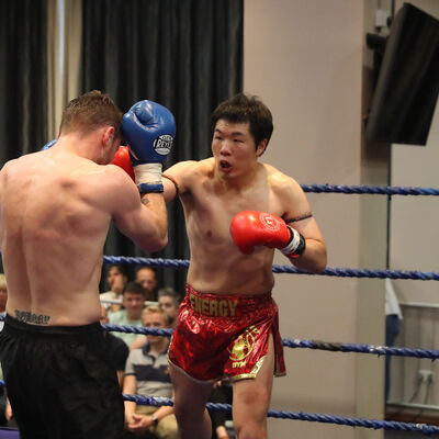 Jihoon Lee lands right hand against Johnny Smith - action from the WKN title match with Jihoon Lee Vs Johnny 'Swift' Smith at the Clayton hotel Belfast on 23rd, June 2019