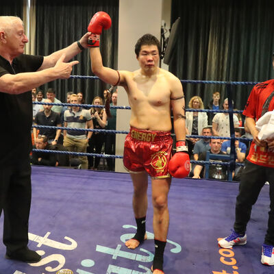 Referee My Bob hunter (ENG) shows respect to Jihoon Lee for a good fight and his bravery - The ProKick event was for the WKN title match with Jihoon Lee Vs Johnny 'Swift' Smith at the Clayton hotel Belfast on 23rd, June 2019