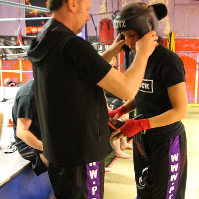 fixing the head guard before sparring