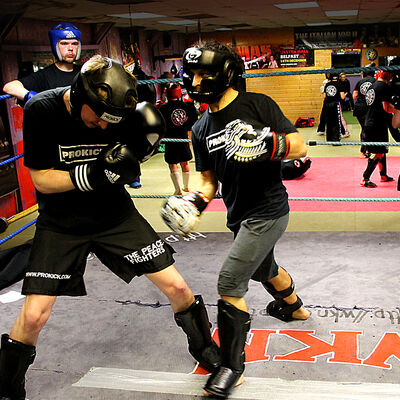 Ben in kickboxing action