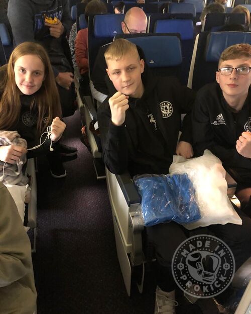 Prokick teens on the plane to Japan.