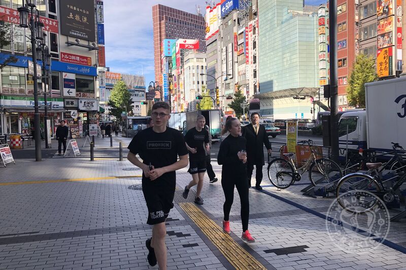 Running through the streets of downtown Tokyo