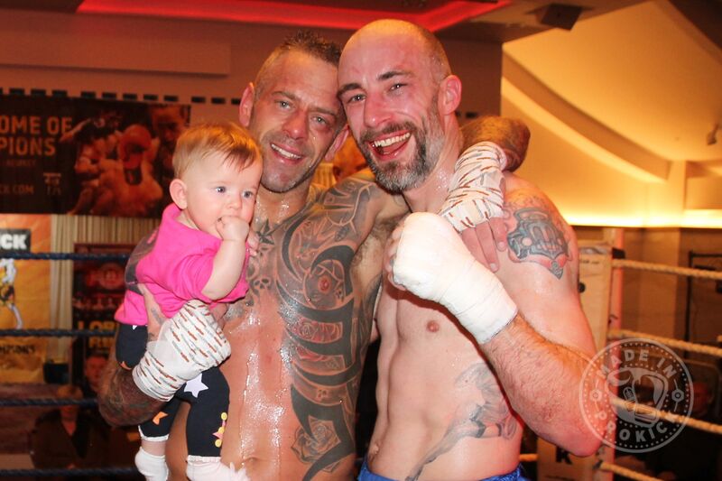 After the battle - Gary Hamilton celebrates his last outing as a fighter with his daughter Evie and tough Scot, Duglas Morrison.