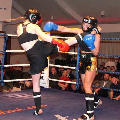 Grace Fires Head Kick