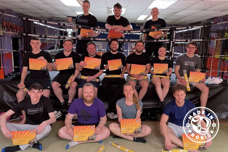 Pictured on Sunday 22nd May 2022 - the team were all at the ProKick Gym before midday in hopes of moving up the ladder of kickboxing excellence by grading to the next level.  Congrats team.
