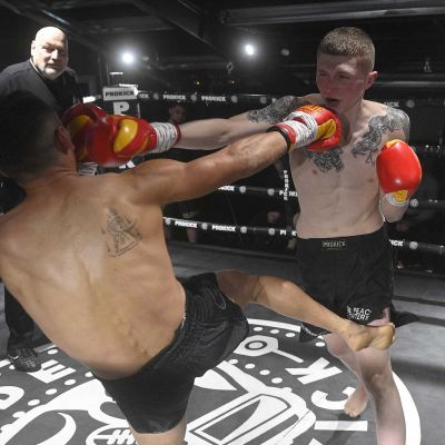 Punch for Punch as Damiano Vacca fires a punch and a kick against the Champion Snoddon at CFL3