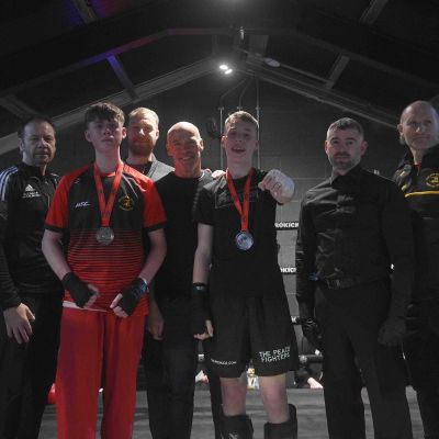 Team picture , both teams and Referee, Wilson Snoddon And MC Gary Gillespie. -  Fighters Max Murray faced Nathan Ewing 14yrs (Golden Dragon, Loop) for a competitive Light-Contact match.