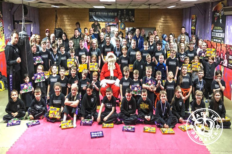 This was the 27th year the BIG MAN himself ‘Santa Claus.’ called to say hello to the Kicking MAD kids at the esteemed kickboxing gym in Belfast. It all happened DEC 22nd 2018.