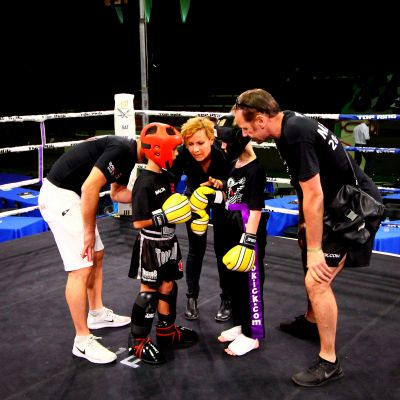 Young fighters listens to rules before the match