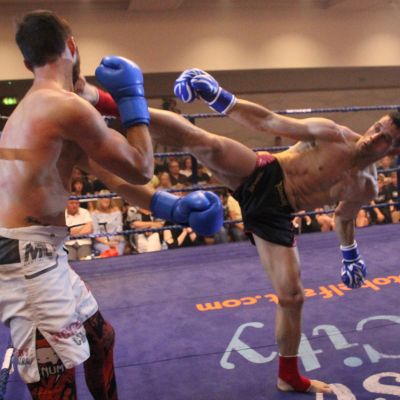 Rafa Del-Toro fires a back kick to Stefanos Stamatiou of (Cyprus) at the Stormont hotel 